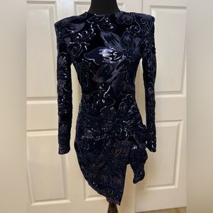 House of CB navy velvet and sequin dress with shoulder pads and long sleeves.